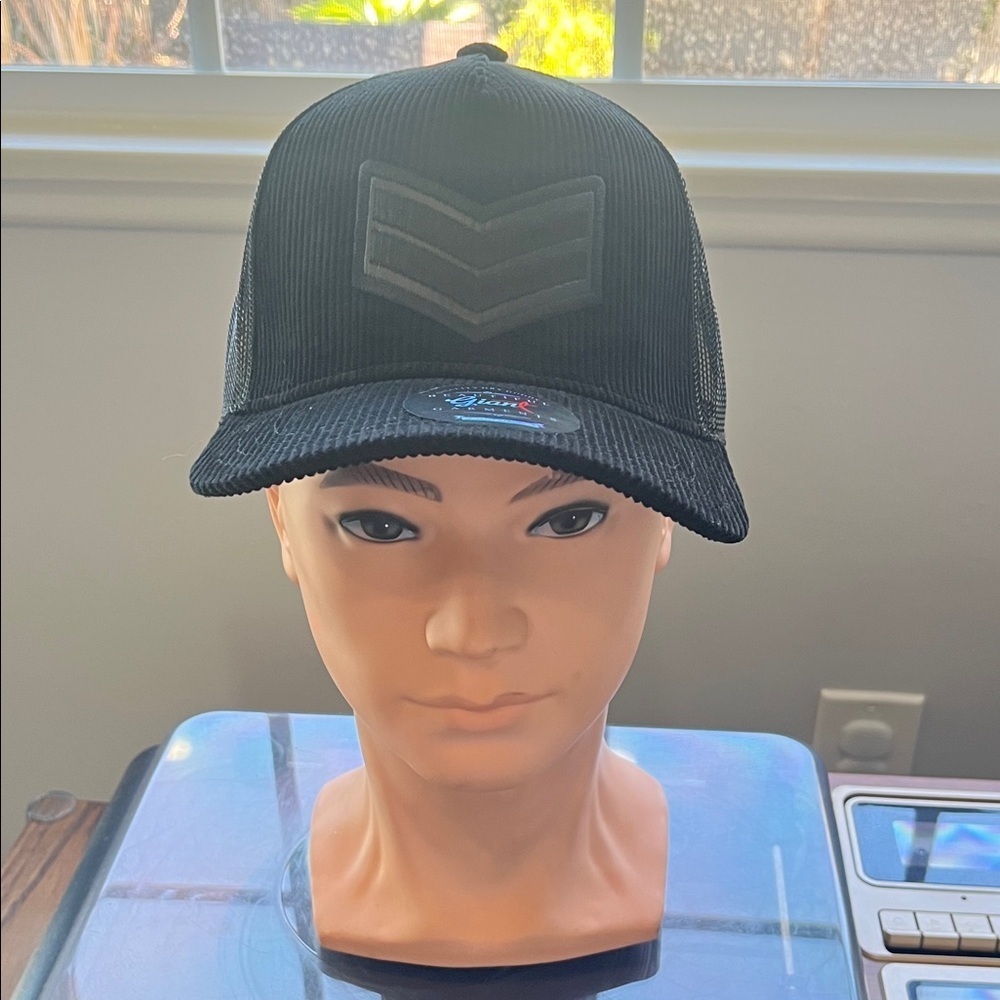 Black Trucker Cap with Chevron Logo